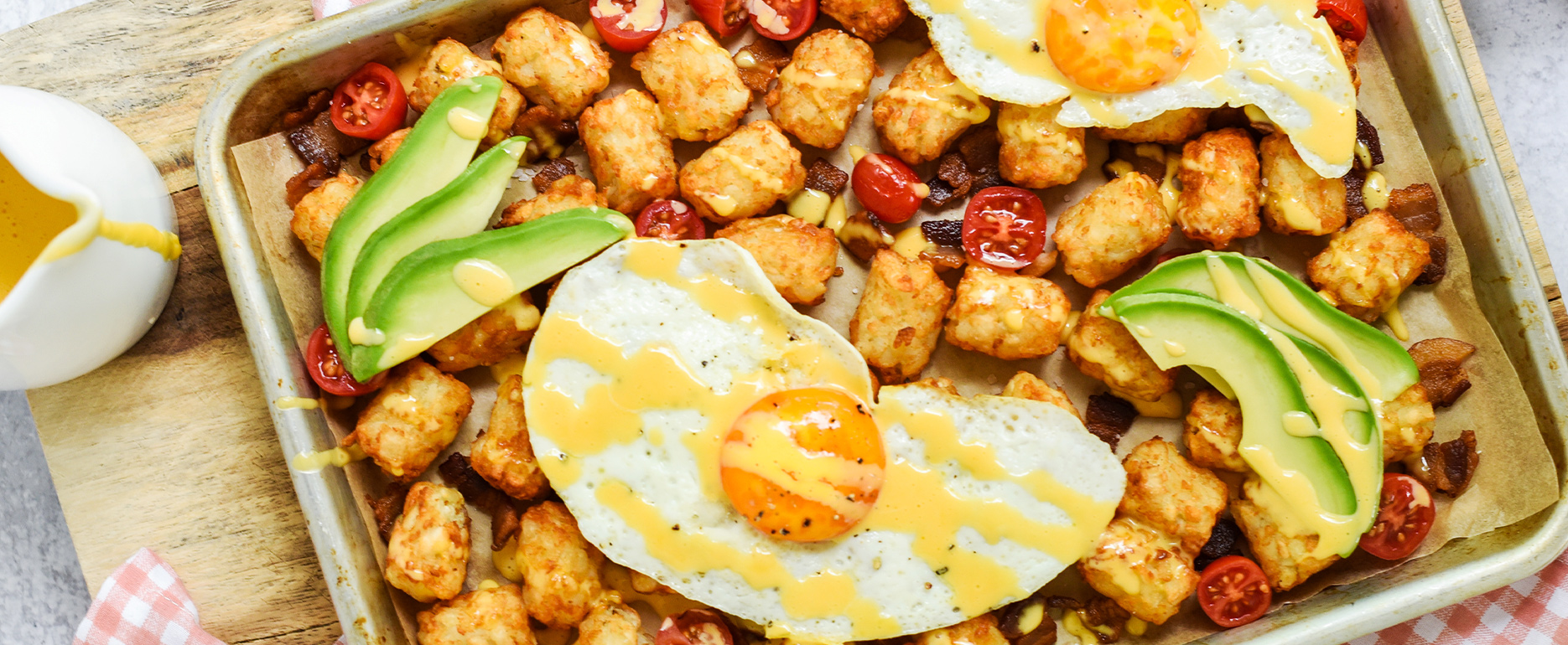 Loaded Breakfast Tots with Bacon, Eggs and Hollandaise Grown In Idaho